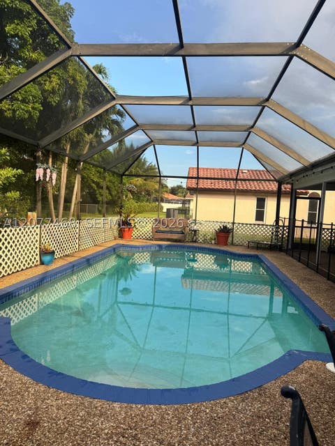 Tiny photo for 913 NW 110th Ln, Coral Springs, FL 33071 (MLS # A12077468)