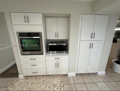 Tiny photo for 913 NW 110th Ln, Coral Springs, FL 33071 (MLS # A12077468)