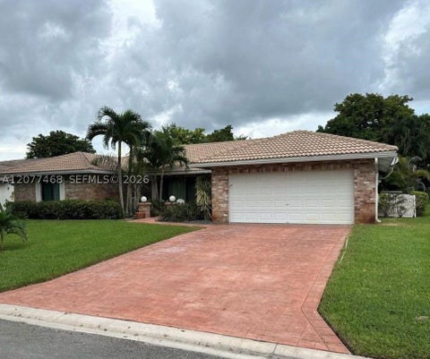 Photo of 913 NW 110th Ln, Coral Springs, FL 33071 (MLS # A12077468)