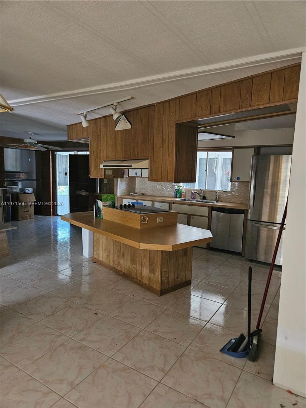 Photo of 109 NW 51st St, Deerfield Beach, FL 33064 (MLS # A11971566)