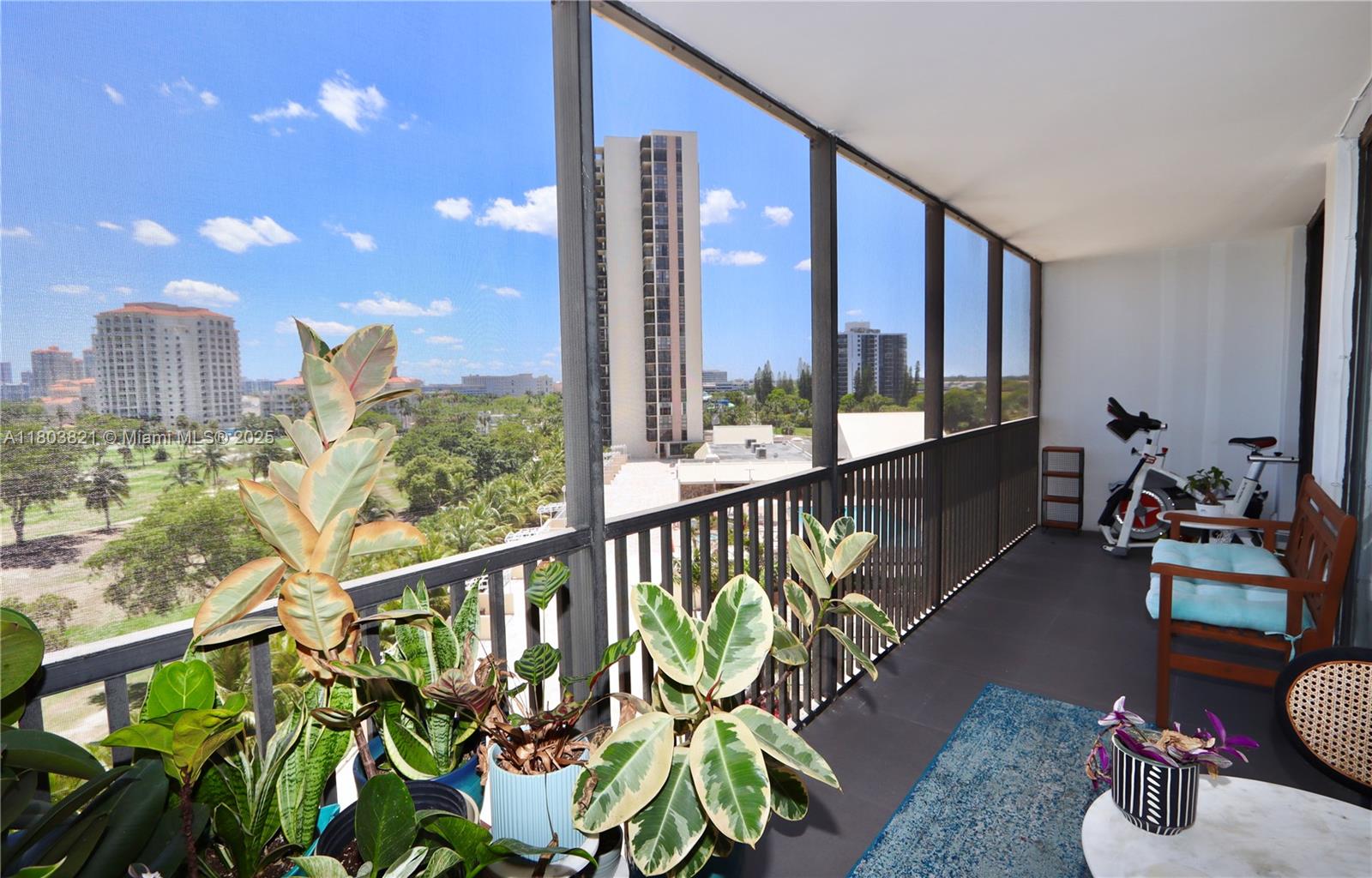STUNNINGLY RENOVATED MODERN 2B/R 2B/A WITH DIRECT GOLF COURSE & POOL VIEWS! STEP INTO LUXURY WITH THIS BEAUTIFULLY RENOVATED, MODERN TWO-BEDROOM, TWO-BATH RESIDENCE FEATURING RENOVATED & UPDATED KITCHEN & BATHROOMS, PORCELAIN FLOORING, A DESIRABLE SPLIT FLOOR PLAN FOR ADDED PRIVACY. ENJOY BREATHTAKING DIRECT VIEWS OF THE LUSH TURNBERRY GOLF COURSE FROM YOUR LARGE PRIVATE BALCONY, WHICH YOU CAN ACCESS FROM THE TWO BEDROOMS & LIVING ROOM, PERFECT TO SIT ON THE BALCONY FOR YOUR MORNING COFFEE OR EVENING SUNSETS. THIS CONDO BOASTS HIGH-END FINISHES THROUGHOUT. THIS IS A BRIGHT UNIT WITH NATURAL LIGHT THAT OVERLOOKS THE GOLF COURSE & THE TRANQUIL POOL. RESORT STYLE LARGE POOL, DECK, GYM, NEW LOBBY & ELEVATORS! COVERED PARKING!