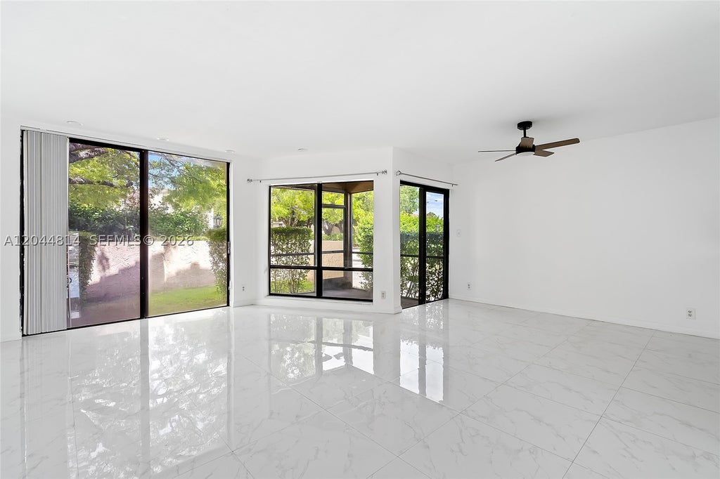 Photo of 9983 W Atlantic Blvd #9983, Coral Springs, FL 33071 (MLS # A12044814)
