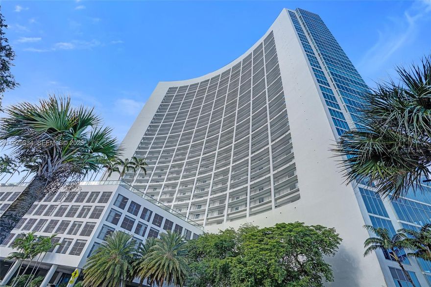 Experience elevated city living at Blue Condo in the heart of Edgewater. This high-floor residence offers sweeping city and water views with a bright, open layout designed for comfort and style. The unit features modern finishes, a spacious kitchen, and generous living areas ideal for both everyday living and entertaining. A rare highlight includes two parking spaces—one assigned and one valet—along with an additional private storage unit, adding exceptional convenience and value. Residents enjoy full-service amenities including 24-hour concierge, resort-style pool, fitness center, spa, business center, and more. Ideally located minutes from Midtown, Wynwood, the Design District, and major highways. Ideal for a primary residence, second home, or investment.