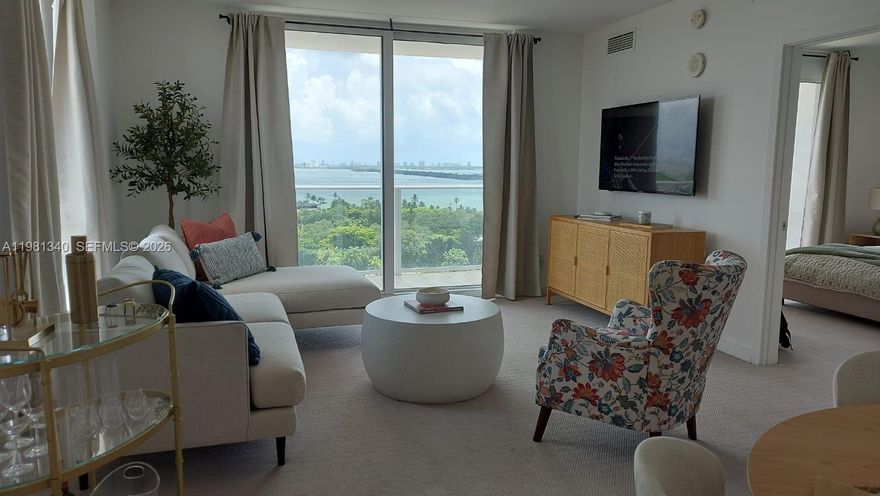Beautiful Furnished 1 Bed plus Den + 1 bath, corner Unit, breathtaking views of Biscayne Bay & Bay Point. Luxury Condominium located 5 min from the Design District & Midtown; Baltus is a boutique building w/only 167 residences in 17 floors, Full amenities:World-class gym,55 foot long pool overlooking Biscayne Bay & Miami Beach,Hot Tube,Club House, Solarium on the roof top lounge & much more. 24 hours security,Walking distance to luxury shops & award winning restaurants, museums & galleries. NEW furnitures. Available April 1.