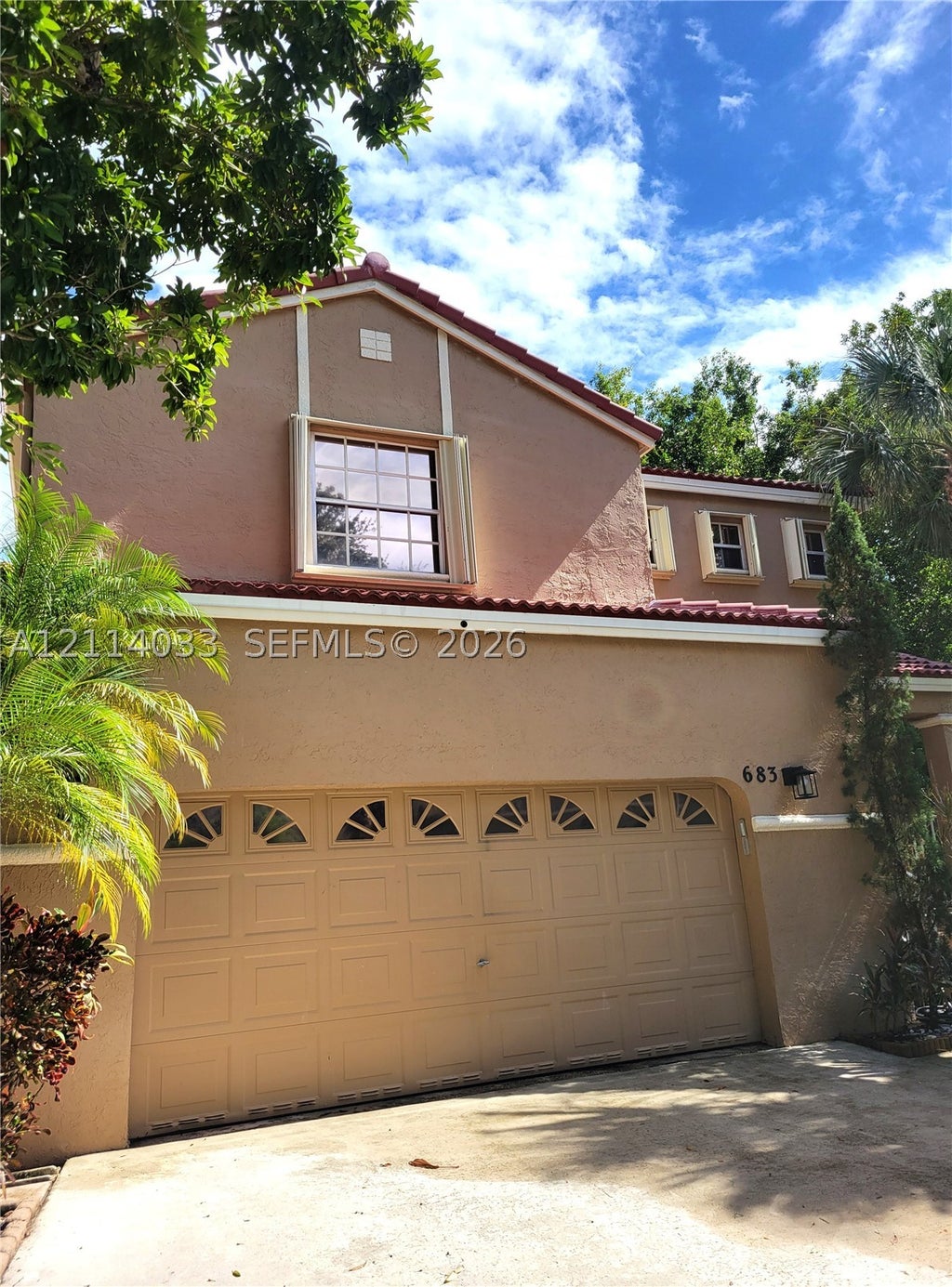 Photo of 683 NW 88th Dr, Coral Springs, FL 33071 (MLS # A12114033)