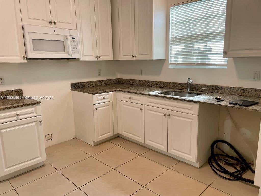 Photo of Riviera Beach, FL 33410 (MLS # A11680130)