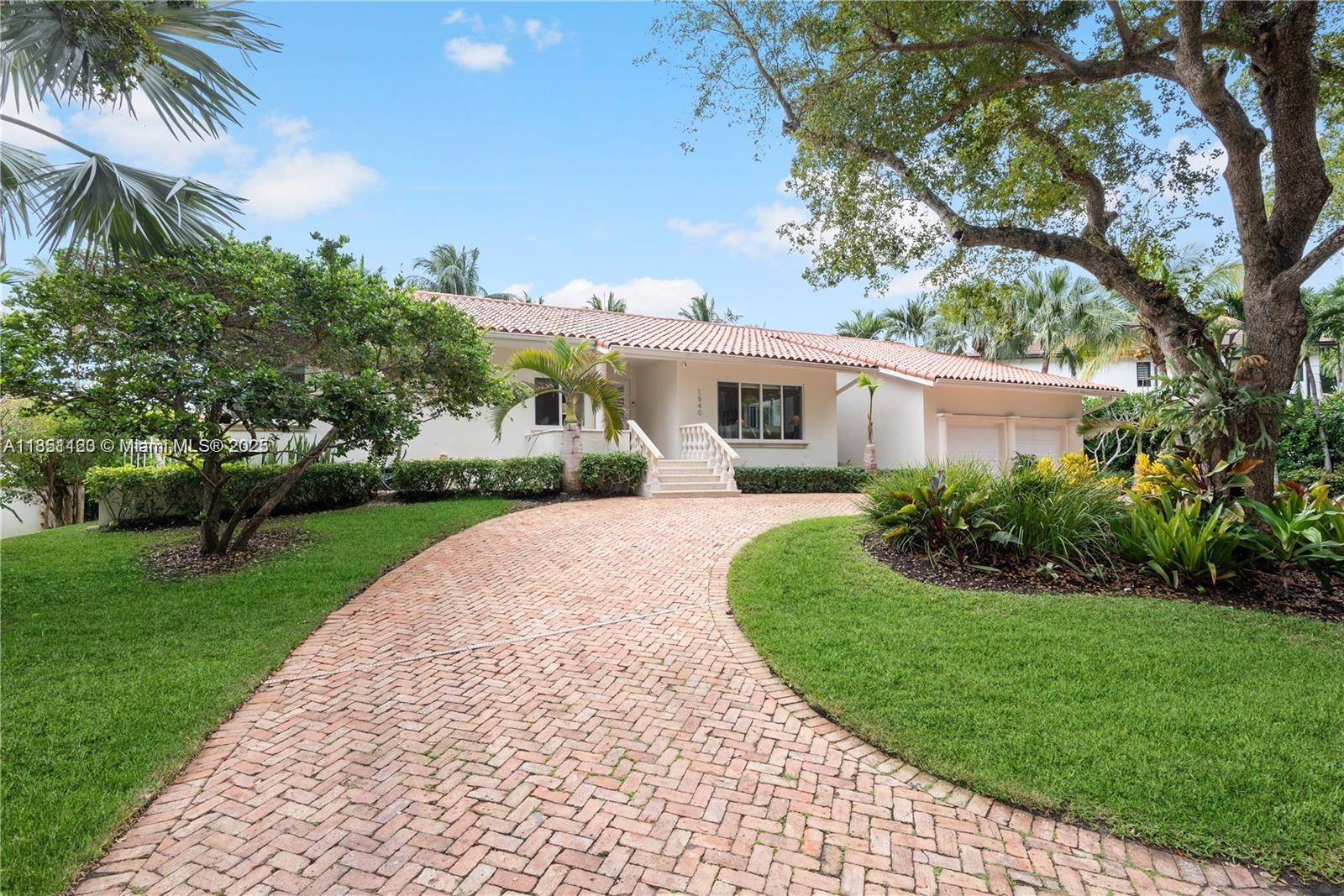 Welcome to your waterfront oasis in the prestigious, guard-gated community of Gables by the Sea. Nestled on an elevated 12,633SF lot, this 4-bedroom/2.5 bath residence seamlessly blends elegance, privacy and resort-style living.
Step inside to travertine and rich hardwood floors throughout, exuding warmth and architectural character. The updated kitchen overlooks the pool and canal-perfect for entertaining family and friends. The spacious primary suite offers serene pool and water views and opens onto the covered patio and summer kitchen-your ideal outdoor staging area for gatherings.
Designed for both comfort and peace of mind, the home features impact-rated windows and doors. Excellent Coral Gables schools (A+ district), lush greenways and nearby Fairchild Tropical Botanic Garden.