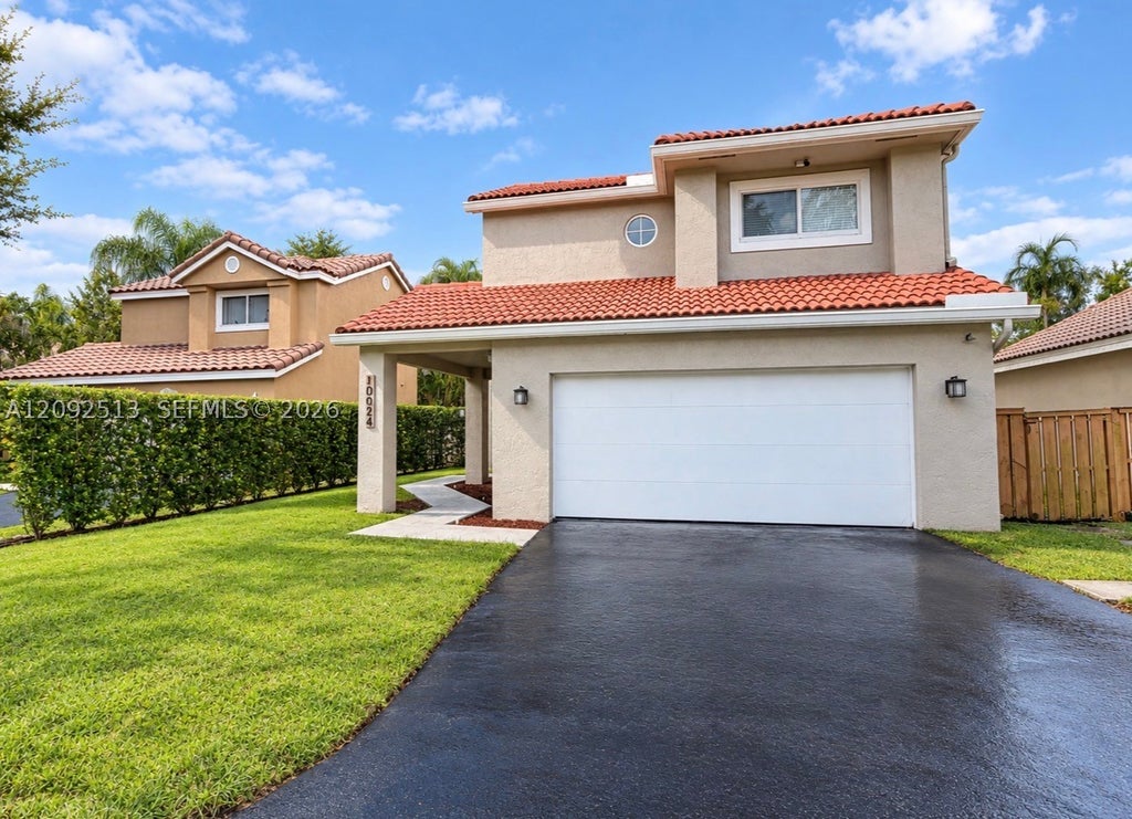 Photo of 10024 NW 4th St, Plantation, FL 33324 (MLS # A12092513)
