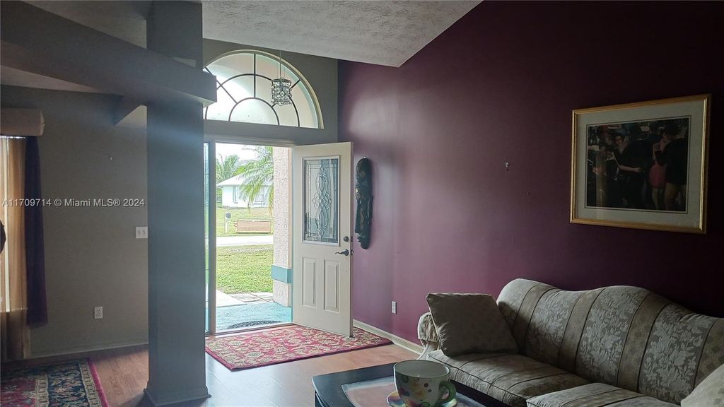 Photo of 550 SE Sunnybrook Ter, Port Saint Lucie, FL 34983 (MLS # A11709714)