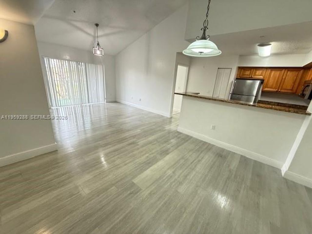 Photo of 12112 Saint Andrews Pl #303, Miramar, FL 33025 (MLS # A11959288)