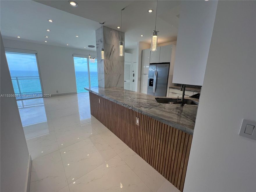 Completely remodeled Penthouse with unobstructed direct Ocean views. Prime location, close to Aventura Mall and Bal Harbour Shops.
The unit was recently renovated and is ready for a new owner, it offers Floor to Ceiling high impact windows, Motorized Solar Shades, big balcony overlooking the ocean, wood paneling decorative walls, open kitchen with GAS STOVE and GAS RANGE, Quartz Counters, White Shany Cabinets, All Stainless-Steel Appliances, Big Second Bedroom, and Very Big Master Bedroom Suite with Two Walk-in Closets. Washer and Dryer already Installed on the unit!!
This high-class building offers tons of amenities, Valet Parking, Concierge, Beach Service, Jacuzzi, Pool, BBQ Area, Gym, Sauna, Steam Room, Game Room with Poker Table and Billiar Table.
