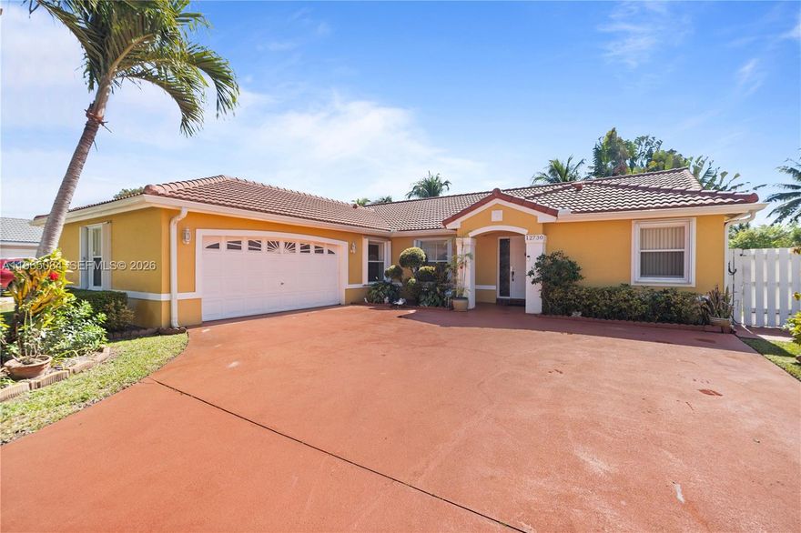 $5000.00 Seller Contribution for rate buy down or closing cost!!  Rarely available Trilogy home in desirable West Miramar! This beautifully maintained 3-bedroom, 2-bath residence is ready for its new owner. From the moment you enter the community, you’ll fall in love with the charming oak tree canopy-lined streets that create a warm and inviting atmosphere.
The home features vaulted ceilings and an open floor plan filled with natural light. Spacious eat-in kitchen offers ample counter space and abundant cabinetry—perfect for cooking and entertaining. Updated bathrooms add modern touches throughout. Enjoy outdoor living on the large covered and screened patio, ideal for relaxing or hosting gatherings.
Additional highlights include a private well with irrigation system, accordion shutters on all openings for added protection and peace of mind, and a very low HOA fee of only $75 per month.
Conveniently located near Pembroke Lakes shops, restaurants, and Pembroke Lakes Mall. Don’t miss this incredible opportunity to own in one of West Miramar’s most sought-after communities!