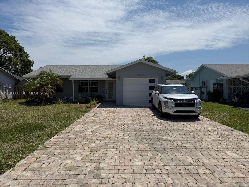 Photo of 8202 NW 91st Ter #8202, Tamarac, FL 33321 (MLS # A12010880)