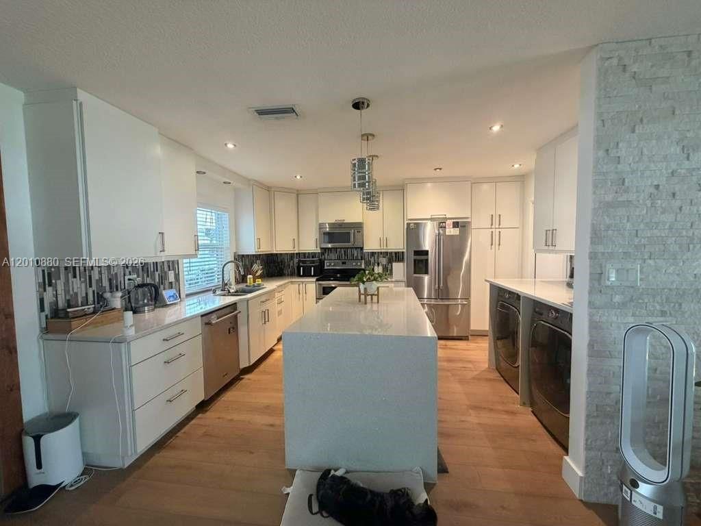 Photo of 8202 NW 91st Ter #8202, Tamarac, FL 33321 (MLS # A12010880)