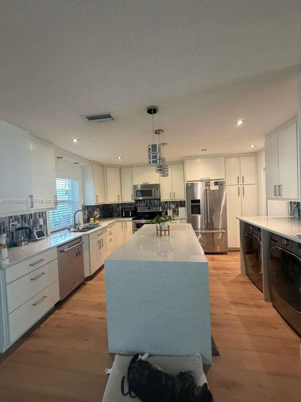 Photo of 8202 NW 91st Ter #8202, Tamarac, FL 33321 (MLS # A12010880)