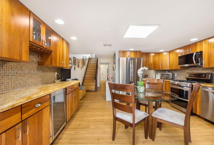 Here's your chance for a sneak peek at a rarely available floor plan in the sought-after Sabal Chase neighborhood. This unit has been lovingly maintained by the same owners for more than 30 years. It features a renovated kitchen with wood cabinets and soft-close drawers, in addition to updated bathrooms, bamboo wood flooring upstairs, solid wood doors, a 2-year-old roof, private patio, and both a new AC and water heater. The floor plan provides for easy, functional living with all bedrooms upstairs. Sabal Chase is an incredible community with lots of amenities, including a pool, gym, basketball court, tennis courts, pickleball and racquetball. The home is just minutes from amazing restaurants (hello, Local Pie!), shops, schools, the Florida Turnpike and the Miami Dade College campus.