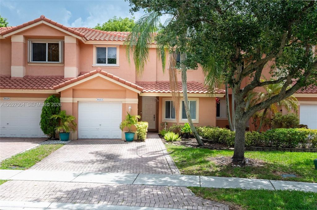 Photo of 5613 NW 125th Ave #5613, Coral Springs, FL 33076 (MLS # A12027004)