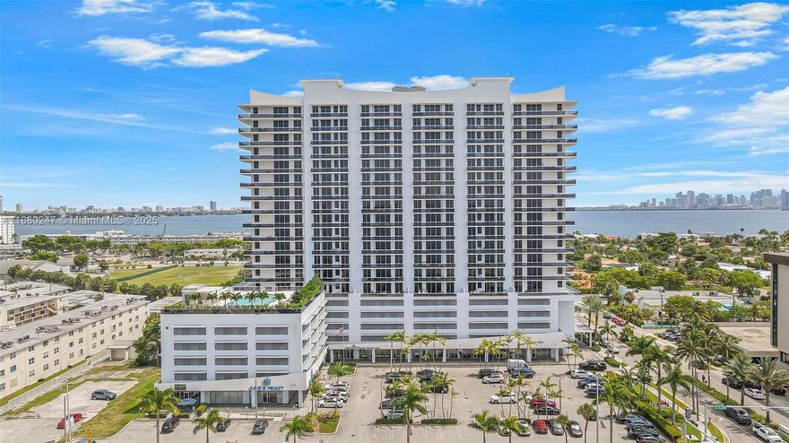 Gorgeous 2 Bedroom/2 Bathroom Condo Located in the Prestigious Lexi Building in North Bay Village. This Unit Features Over 1400SQFT of Living Area and a HUGE 600SQFT Balcony/Patio. This Unit Features Wood Flooring All Throughout, An Open Kitchen with Stainless Steel Appliances Including a Wine Cooler. Primary Bathroom Features Shower, Tub, Dual Sinks and Bidet. Both Bedrooms have Dual Closets with Each Room Having a Walk in Closet with Closet Systems. The Expansive Balcony is One of a Kind and Overlooks the Biscayne Bay! The Building Features a Newly Renovated Pool, Community Room with Kitchen Area and Pool Table, EV Charging Stations and An Amazing Gym with One-of-a-Kind Views. Unit Comes with *2* Assigned Parking Spots!