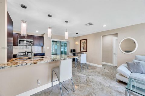 Photo of 5606 NW 49th Ave, Tamarac, FL 33319 (MLS # A11887617)