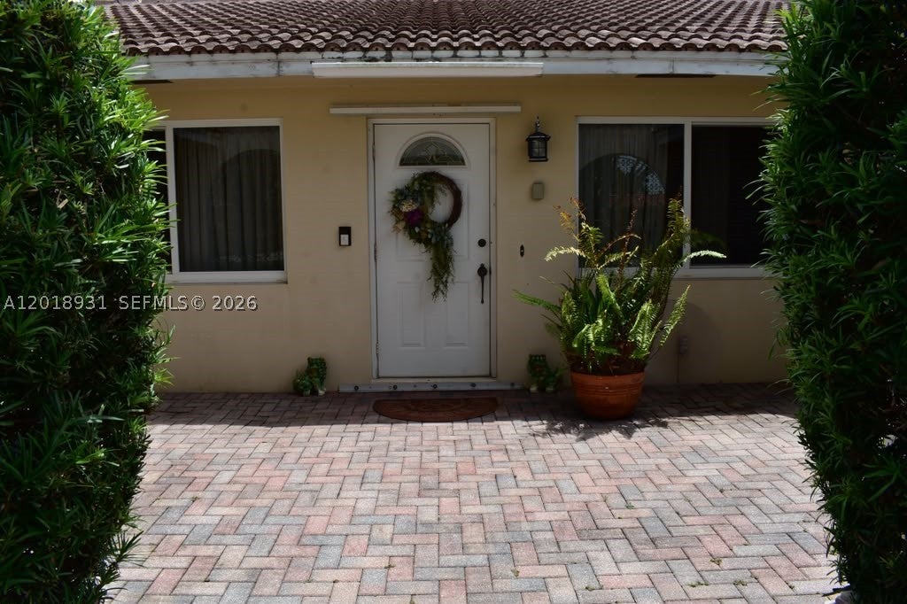 Photo of 3634 Lowson Blvd, Delray Beach, FL 33445 (MLS # A12018931)