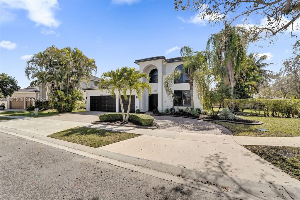 Photo of 13076 NW 14th St, Pembroke Pines, FL 33028 (MLS # A11981326)