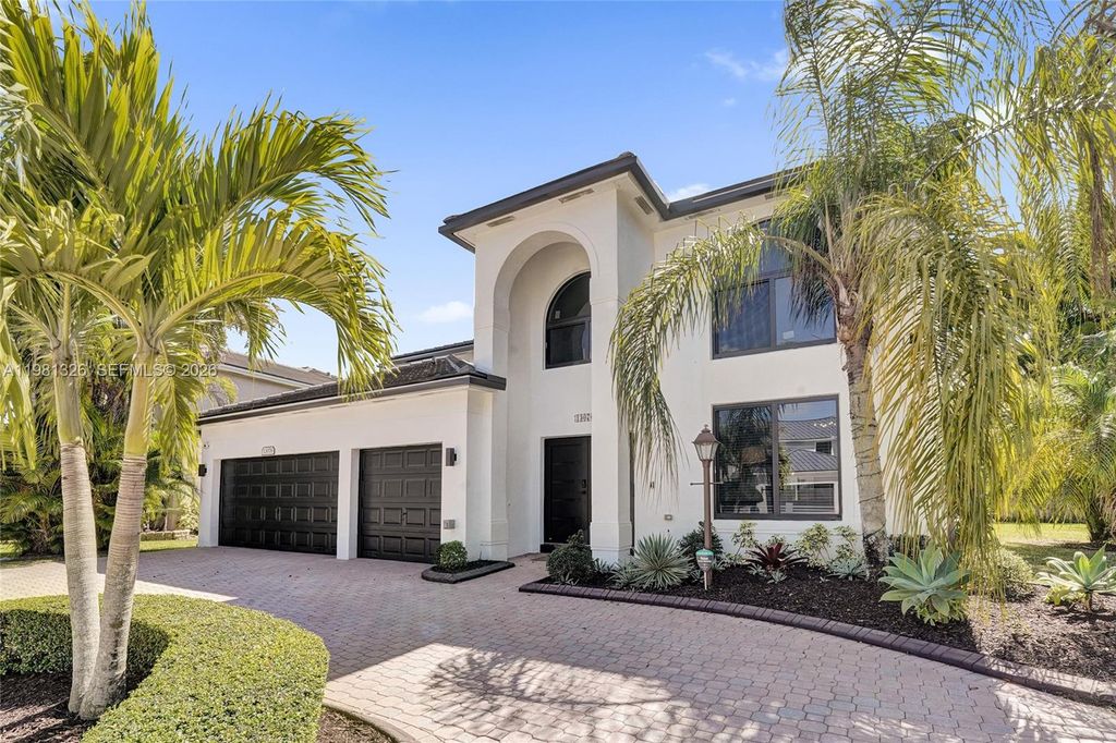 Photo of 13076 NW 14th St, Pembroke Pines, FL 33028 (MLS # A11981326)