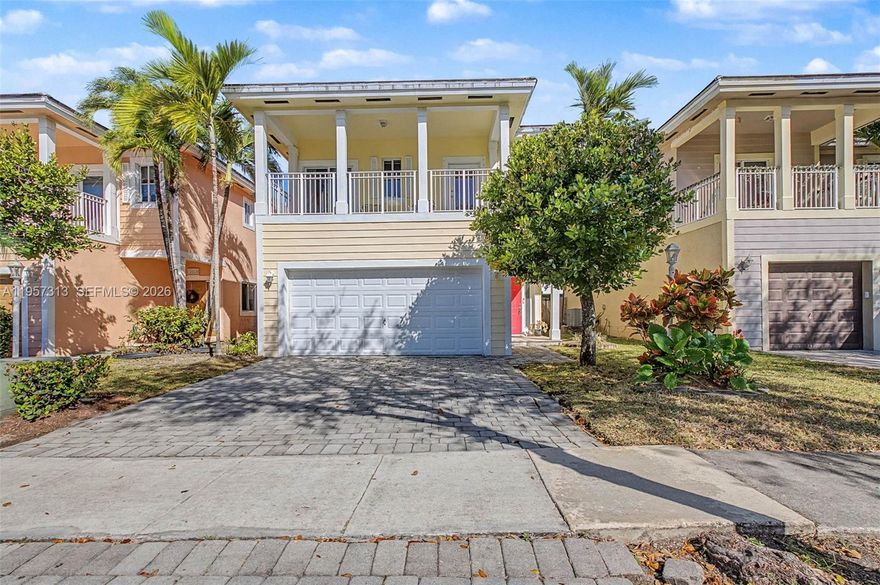 Updated 4 bdrm, 2.5 bath, 2 story beauty in the gated community of Isle of Oasis. Great floorplan! Open living area w/ fabulous natural light. Remodeled kitchen features white cabinetry, slate countertops & sky-blue tile backsplash w/ plenty of counter seating opens to dining area & overlooks the perfectly manicured backyard. Upstairs you will find all 4 bdrms & conveniently located laundry rm. Spacious primary suite w/ walk in closet. Primary bath features dual sinks. Ample sized guest bdrms, 2 w/ balcony access. Complete panel hurricane shutters. Fantastic backyard w/ patio, plenty of grass for the kids and pets, orchid potting area & a treehouse! 2 car garage & paver driveway. Community features large community rm, pool, children’s splash pad, playground, fitness center & sauna.
