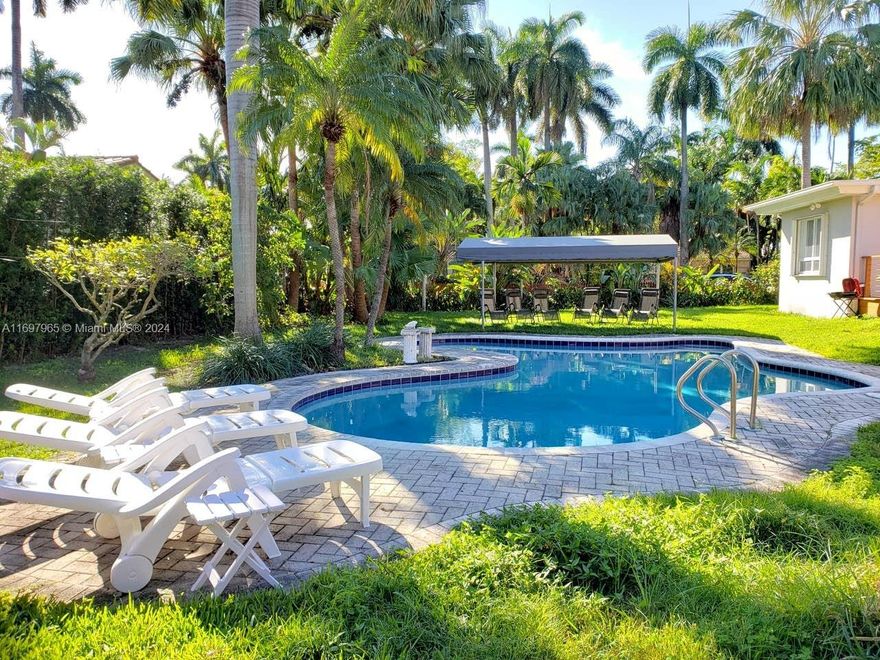Charming Home in Prime Hollywood, FL Location. This spacious property is ideally located in the historic Hollywood neighborhood, just east of US1. Situated on a generous double corner lot, this home offers great potential for customization. You'll be within walking distance to Young Circle Arts Park and downtown Hollywood, where great restaurants and entertainment await. A short bike ride takes you to the famous Broadwalk and Hollywood Beach. Embrace this opportunity to enjoy the best of Hollywood living. Schedule a viewing today!
