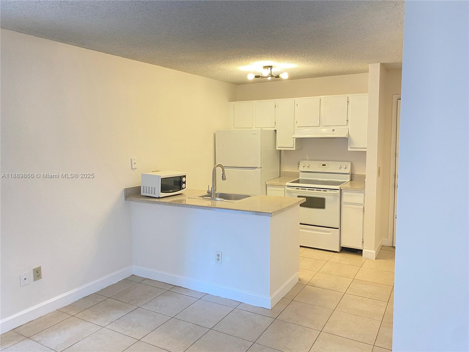 PALM AIRE GARDENS CONDO - Residential Lease