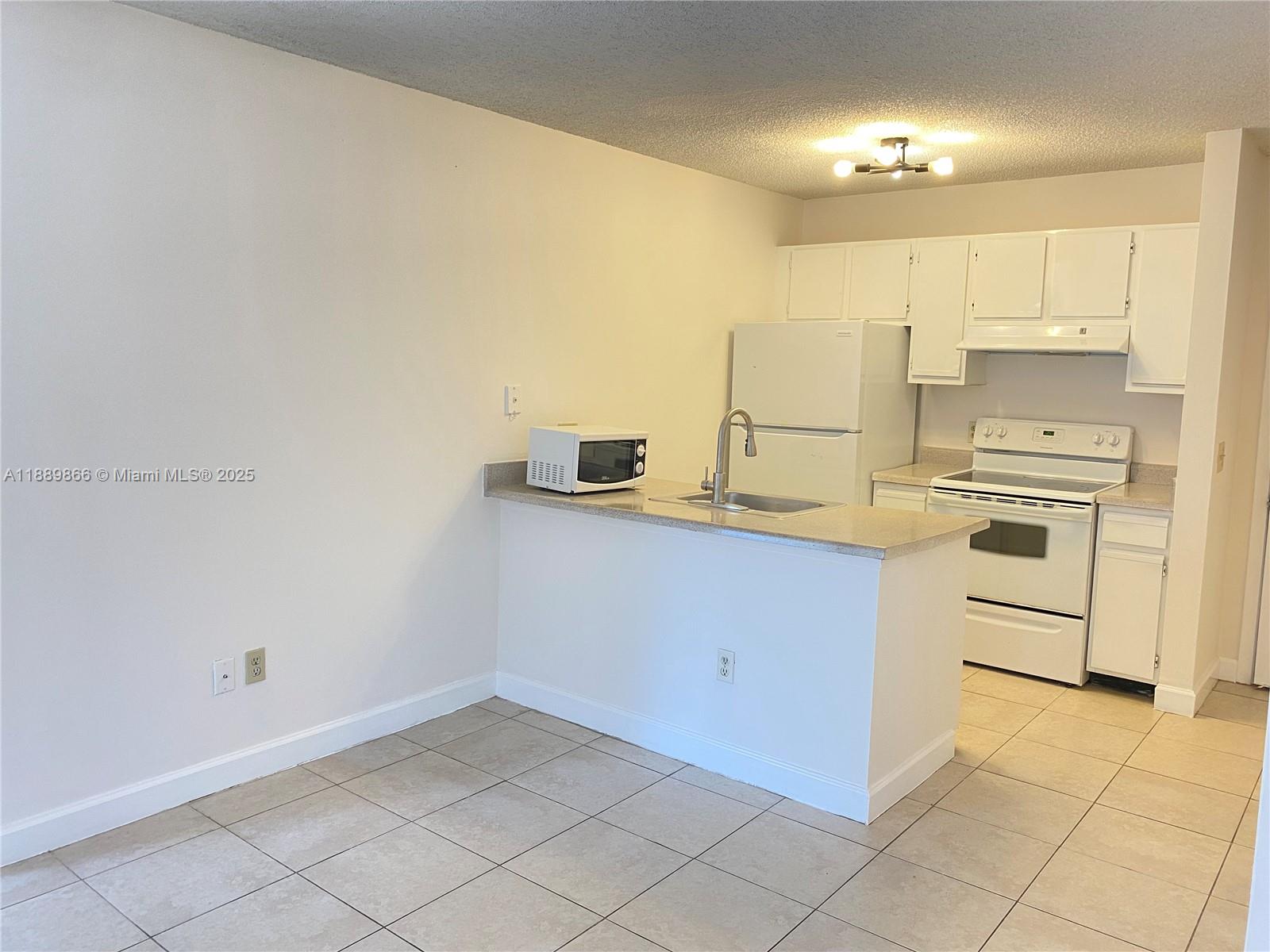 PALM AIRE GARDENS CONDO - Residential Lease