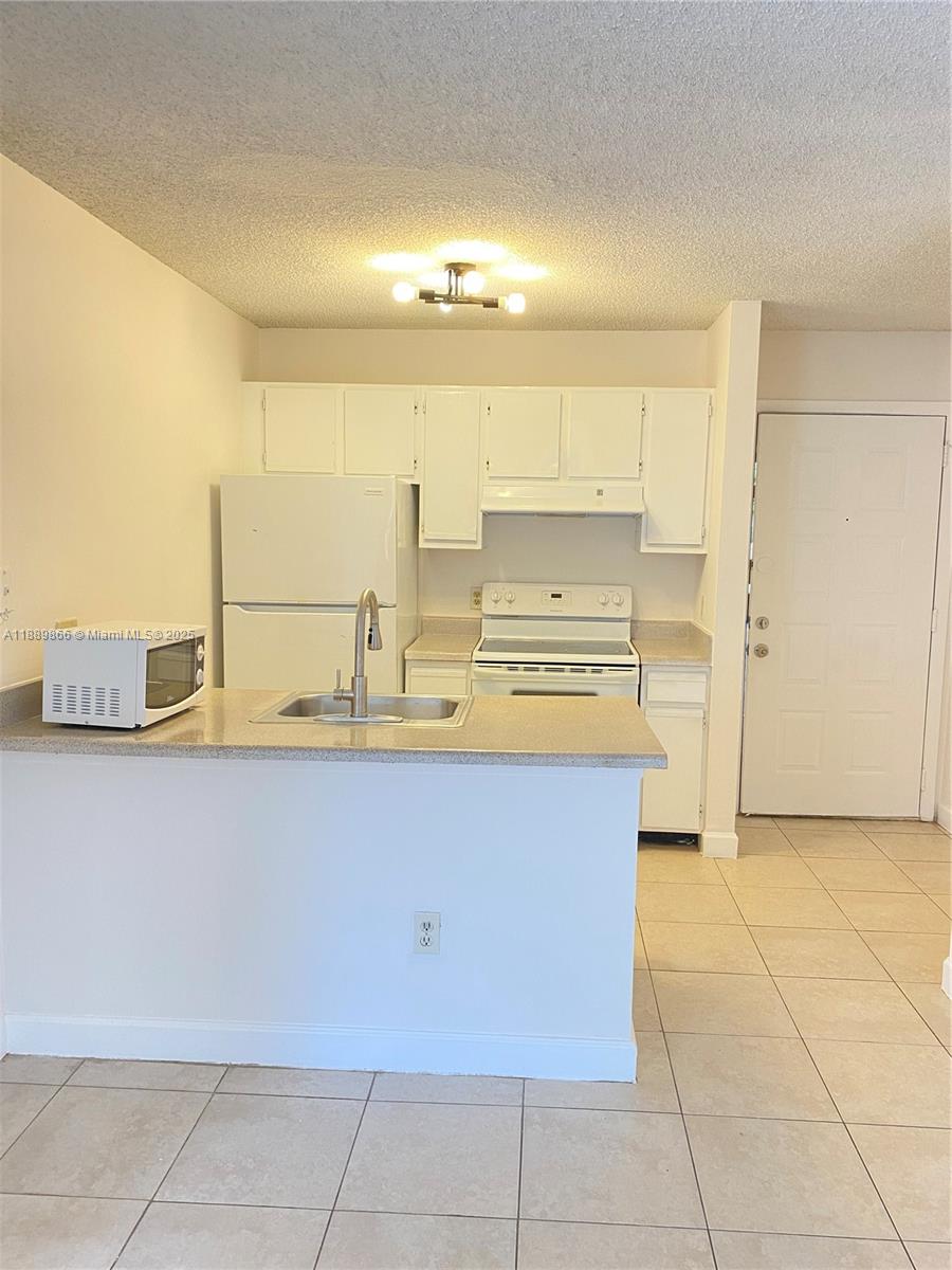 PALM AIRE GARDENS CONDO - Residential Lease