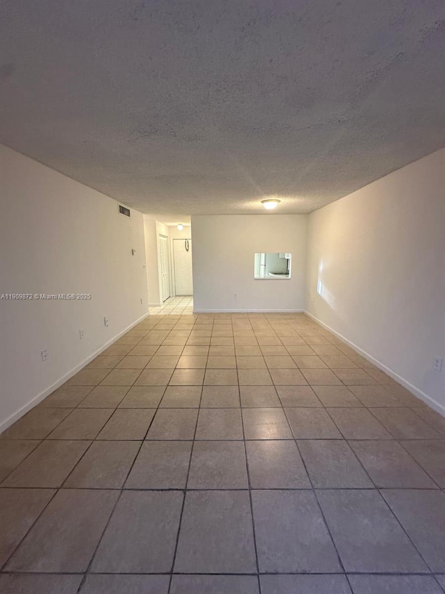 NEW WORLD CONDO APTS IV - Residential Lease