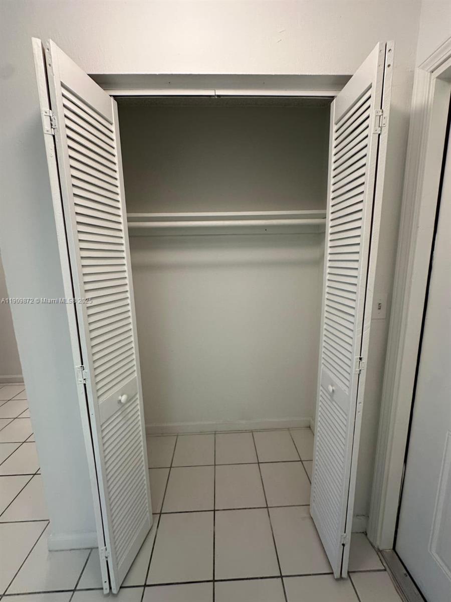 NEW WORLD CONDO APTS IV - Residential Lease