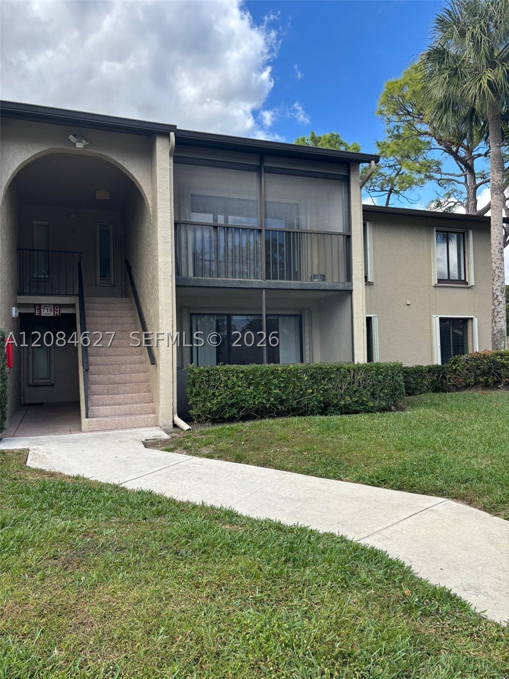 Photo of 718 Sunny Pine Way #H2, Green Acres, FL 33415 (MLS # A12084627)