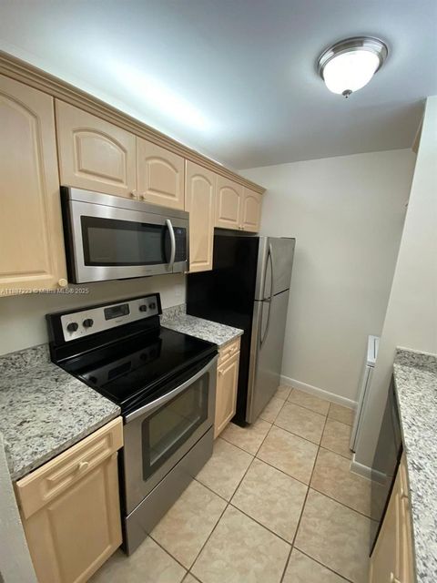 Photo of 10194 Twin Lakes Dr #14-A, Coral Springs, FL 33071 (MLS # A11887223)