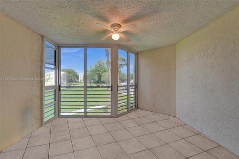 Photo of 1900 Sabal Palm Dr #201, Davie, FL 33324 (MLS # A11871604)
