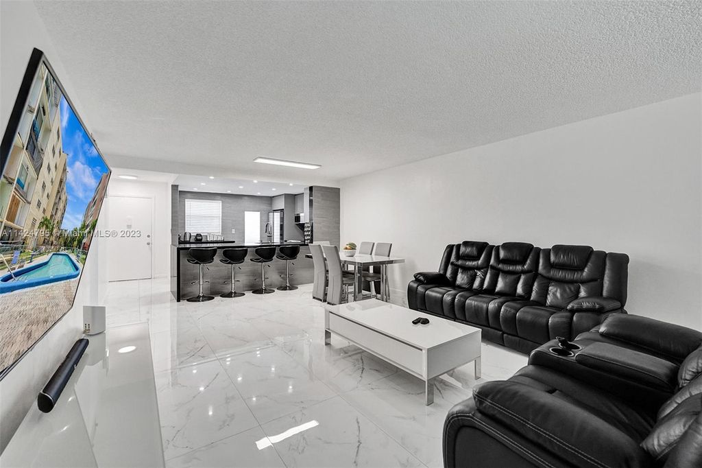 Photo of 320 NE 12th Ave #102, Hallandale Beach, FL 33009 (MLS # A11424795)