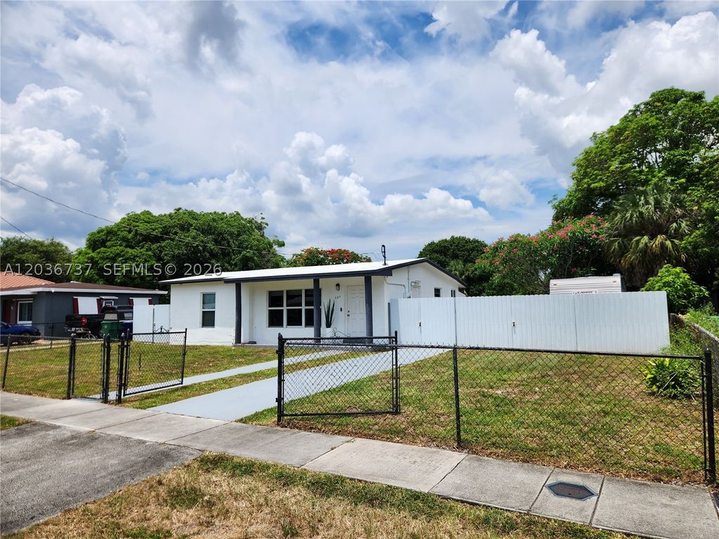 Photo of 721 NW 33rd Ave, Lauderhill, FL 33311 (MLS # A12036737)