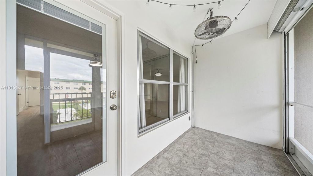 Photo of 810 SE 7th St #306, Deerfield Beach, FL 33441 (MLS # A11913137)