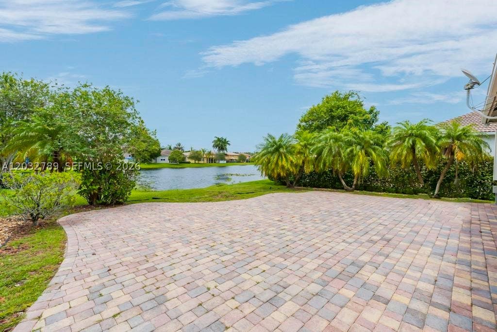 Photo of 19301 Seneca Ave, Weston, FL 33332 (MLS # A12032789)