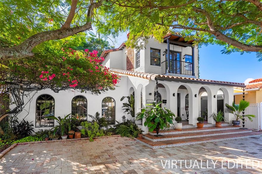 Ivy-adorned residence in the heart of Shenandoah! This charming two-story home blends timeless character with modern comfort, featuring a new roof, gorgeous brick fireplace, and a warm mix of wood, tile & polished concrete floors. Upstairs, you’ll find two bedrooms with Juliet balconies that share a full bathroom, while the original third bedroom downstairs has been opened into a spacious family room—easily converted back if desired. The second full bathroom is located inside this converted space; if enclosed, it could function as an en-suite. Additional features include a few impact windows and thoughtfully curated interiors designed for both style and function.

Outdoor areas include a covered patio and bar, offering great space for entertaining.

Set in the heart of Shenandoah, one of Miami’s most historic and centrally located neighborhoods, this home places you minutes from Brickell, Coral Gables, Coconut Grove, Little Havana, and Downtown Miami. Residents love Shenandoah for its tree-lined streets, diverse architecture, community feel, and proximity to top dining, parks, and cultural destinations.

A rare opportunity to own a character-filled home in one of Miami’s most desirable and convenient neighborhoods.