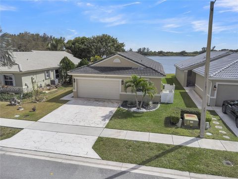 Photo of 9900 S Grand Duke Cir, Tamarac, FL 33321 (MLS # A11979295)