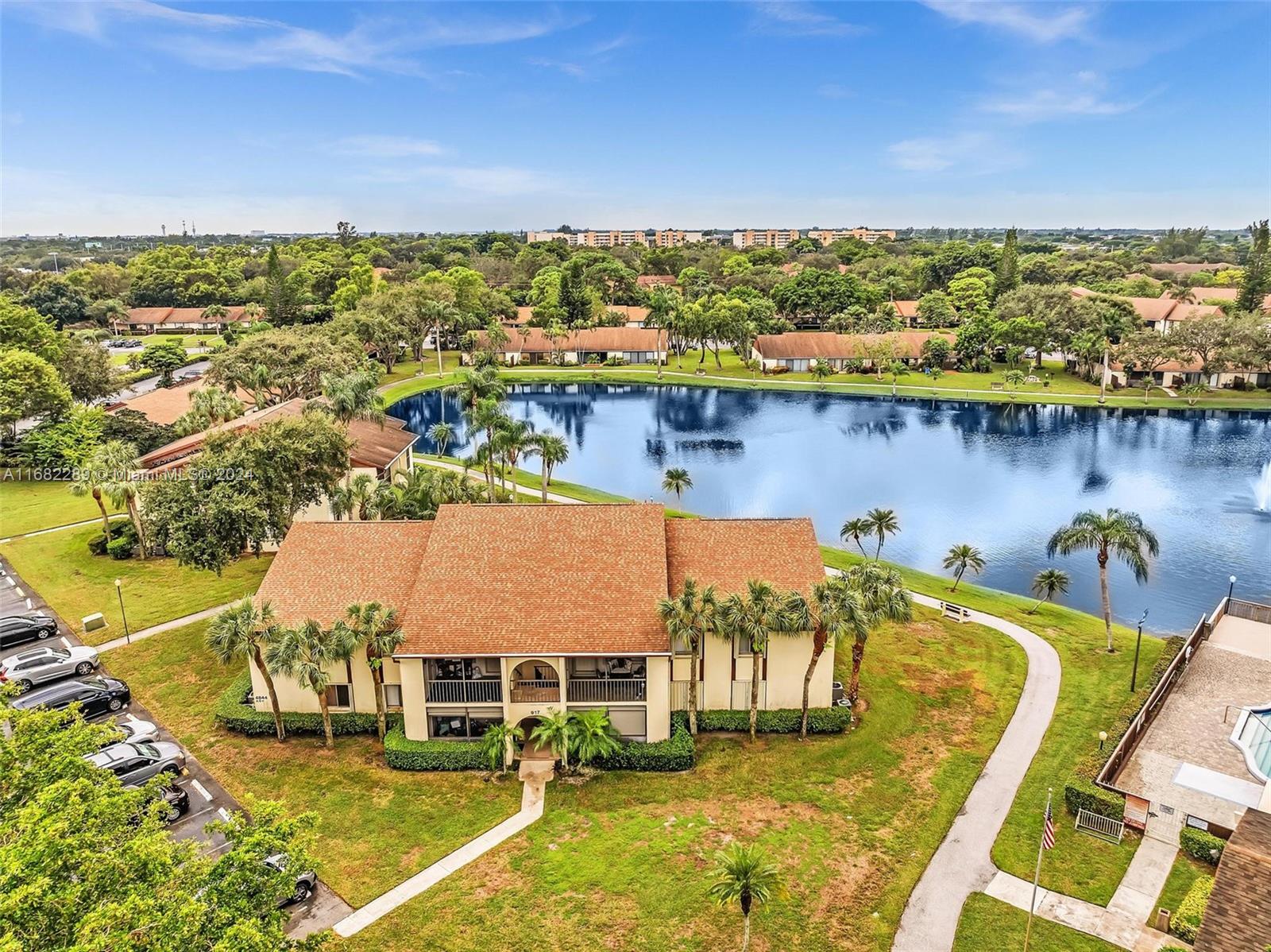 **Stunning Lake View Condo Next to Clubhouse!** Welcome investors!
Experience serene living in this spacious unit with breathtaking lake views and convenient access to the clubhouse. This 2 Bed / 2 Bath unit is on the first floor, building entry level. Tiled throughout, this home features an enclosed patio perfect for relaxation. The gated community offers fantastic amenities including a pool, tennis court, and playground, all while being just minutes from Palm Beach Outlets, downtown, I-95, Turnpike, and the airport. Minimum credit score of 690 required by HOA. This unit is vacant and easy to show—don’t miss out on this exceptional opportunity!
