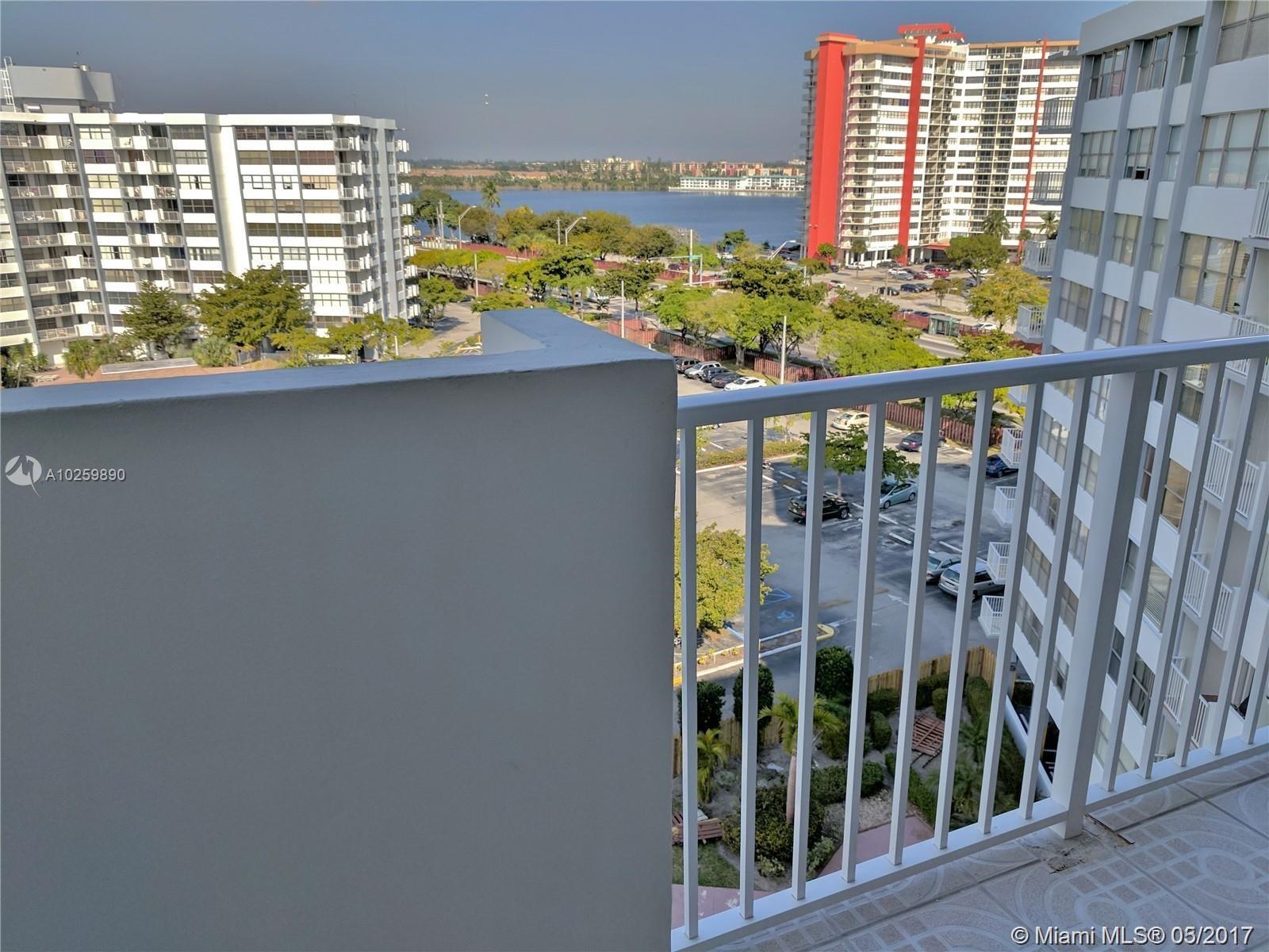 Immaculate unit with a 180 degree panoramic view to the lakes and daily sunsets. Everything has been updated! Wood floors, granite counters, new appliances, new bathrooms, etc! Very spacious one bedroom with den. Two huge walk in closets! One assigned parking space. No pets allowed in the building.