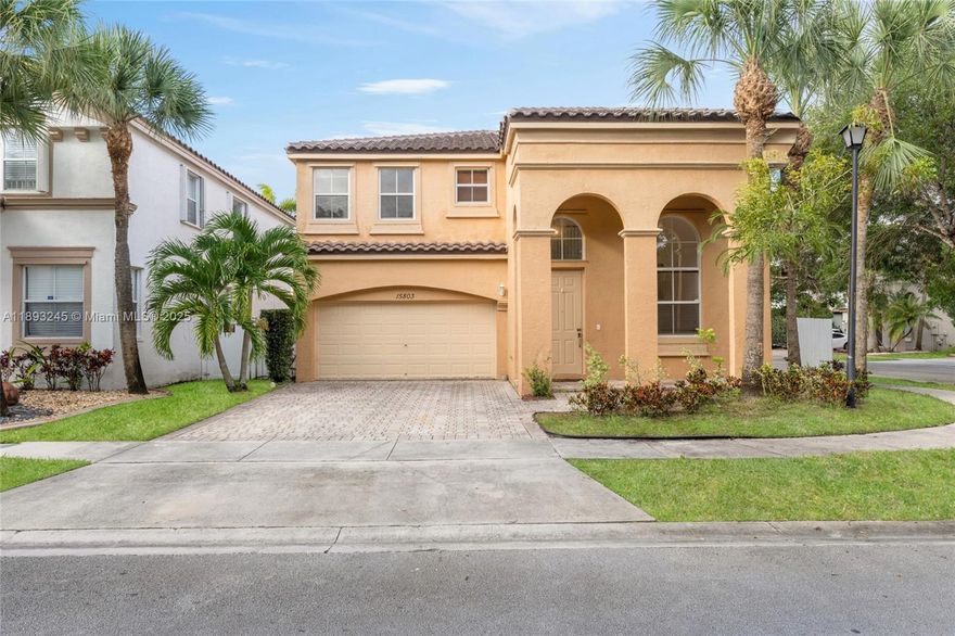 Stunning 4-bed, 2.5-bath corner-lot home in Riviera Isles’ sought-after Sorrento community! Enjoy peace of mind with a brand-new roof and new A/C. From the moment you enter, you’ll love the soaring vaulted ceilings, abundant natural light, and open layout perfect for entertaining. Features include a 2-car garage, tile and wood flooring, spacious eat-in kitchen with island, and indoor laundry room. Nestled on one of the largest lots with lush landscaping and plenty of outdoor space. Live the resort lifestyle with gated security, pool, clubhouse, gym, and tennis—all minutes from top-rated Broward schools, shops, hospitals, and major highways.