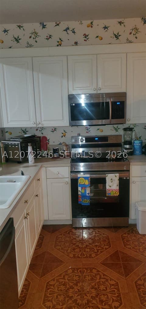 Tiny photo for 7775 Yardley Dr #211, Tamarac, FL 33321 (MLS # A12072246)