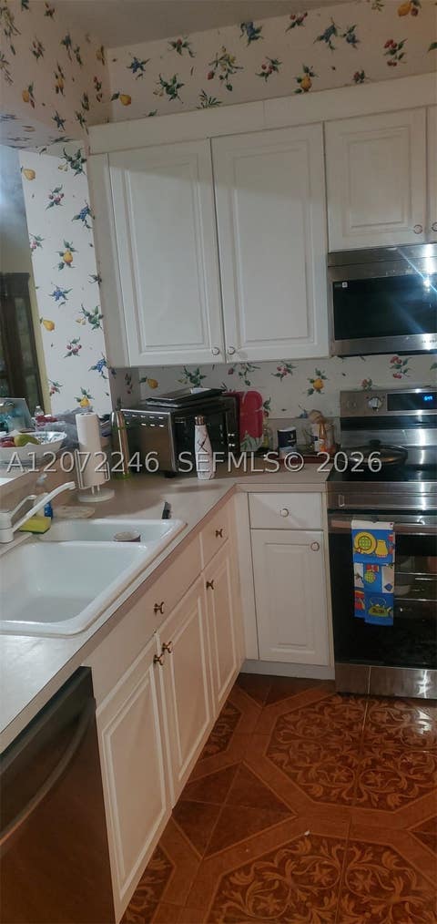 Tiny photo for 7775 Yardley Dr #211, Tamarac, FL 33321 (MLS # A12072246)