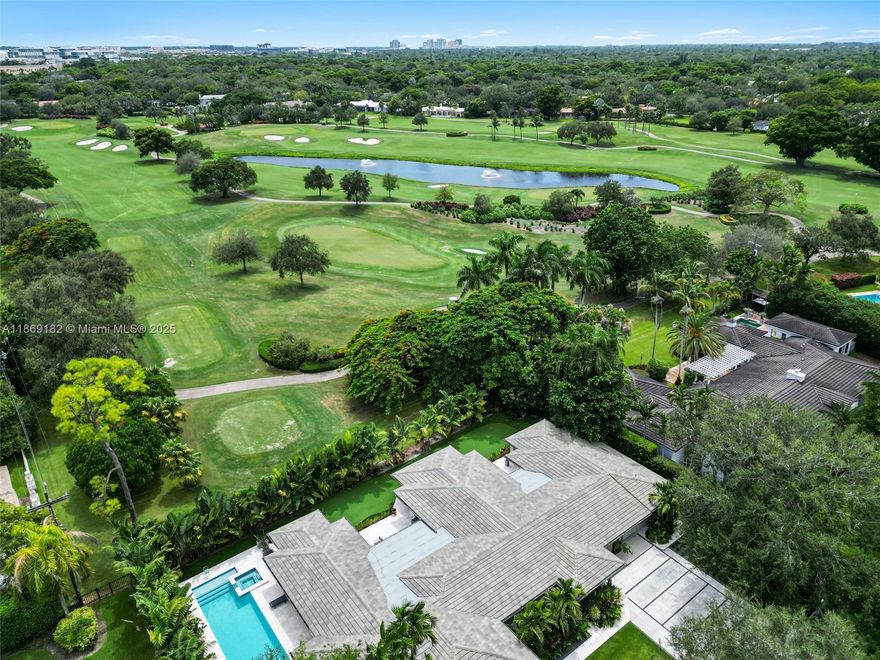 Set on a 19,000 sq. ft. lot overlooking the 15th hole at Riviera Country Club, this 2023 fully renovated residence combines modern luxury with timeless design. Comprehensive updates include new roof, plumbing, electrical, A/C, impact windows, and more. An open floor plan highlights a chef-inspired Italian kitchen and a private primary suite with serene golf course views. Outside, the resort-style backyard offers a heated saltwater pool, 2,500 sq. ft. putting/chipping green, and manicured grounds—ideal for both entertaining and relaxation.