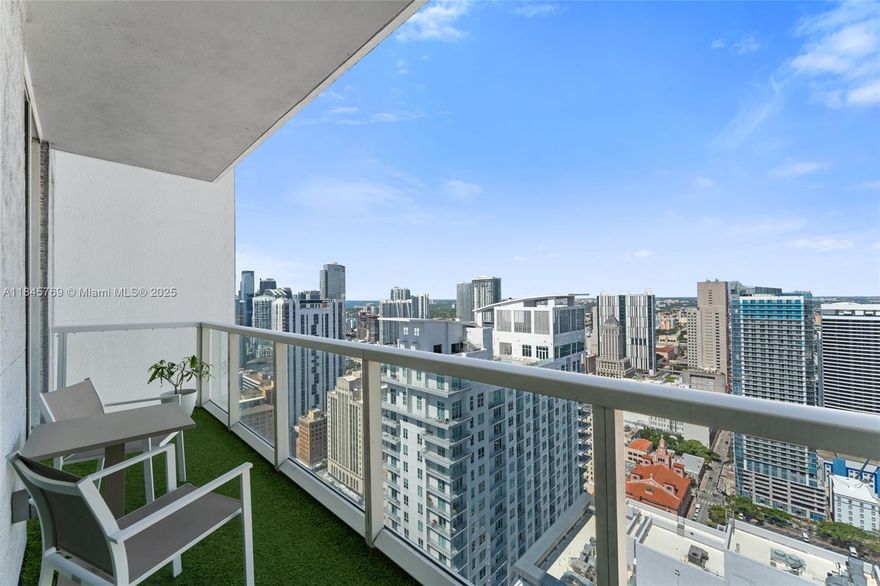 Spacious 2B/2B unit with floor-to-ceiling windows and two balconies offering stunning sunset views. Thoughtful layout includes a primary suite with spa-style bath and custom walk-in closets. Features Italian ceramic and laminate flooring, KitchenAid appliances, and high-end finishes. Blackouts in bedrooms and screens in living/dining areas. Parking on 3rd floor.
Enjoy resort-style amenities: one heated lap pool, two standard pools, a Silent Pool, sauna, steam room, fitness center with cardio and weights areas, plus daily classes (yoga, spinning, step). Also includes movie theater, billiards, ping pong, and 24-hour front desk & security.
Prime location near Bayfront Park, Brickell City Centre & Miami World Center. Steps from Metromover, Whole Foods, Starbucks, and top dining & nightlife.