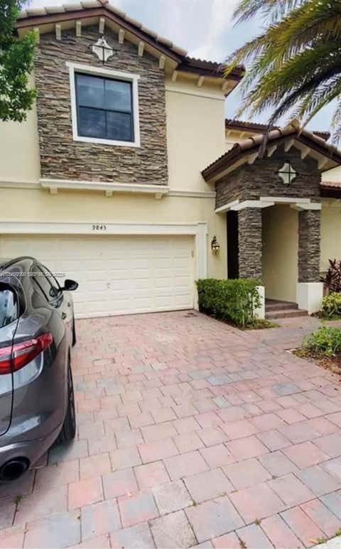Photo of 9845 NW 86th Ter, Doral, FL 33178 (MLS # A12016659)